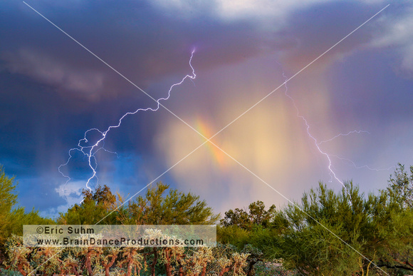 Microburst, lightning and rainbow